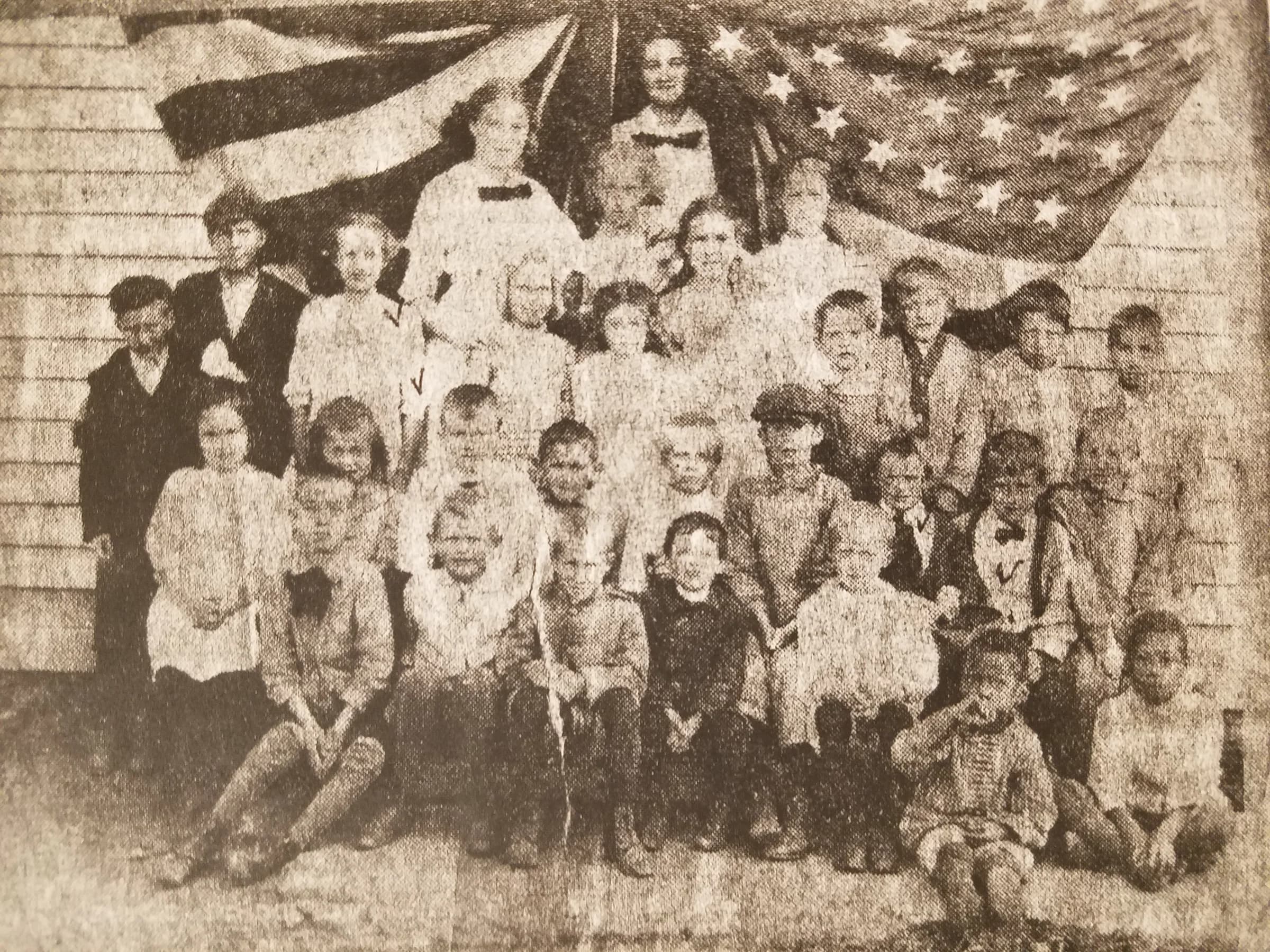 An archival photograph of the Lamington community